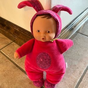 Corelle brand bunny light up and songs doll 11” has a couple dots on eyes